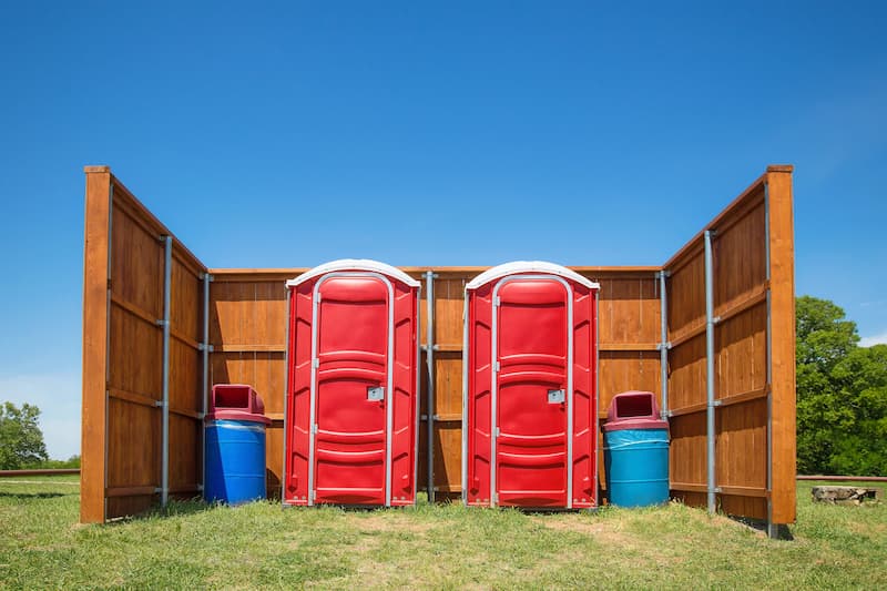 Short-term porta potty units staged for delivery in Van Buren, Arkansas